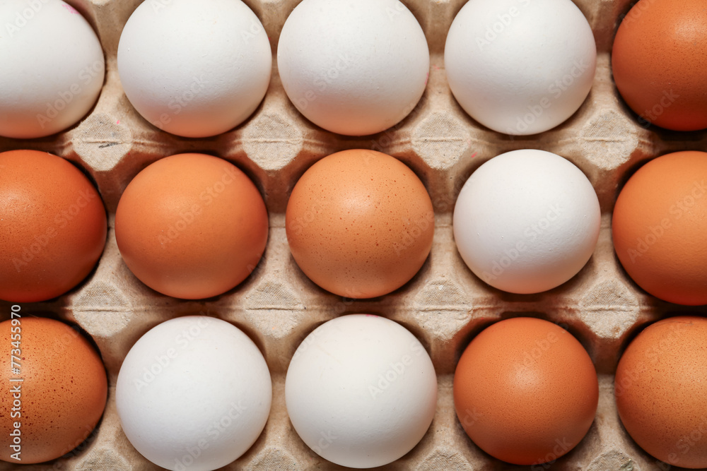 Chicken eggs in cardboard box as background Chicken eggs in cardboard box as background