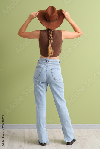 Young woman in stylish jean...