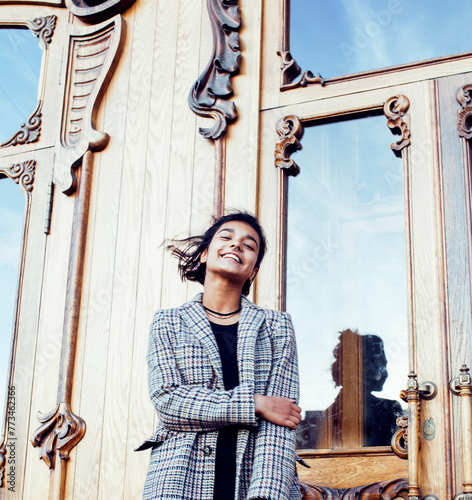 young pretty student teenage indian girl in doors happy smiling, having fun, lifestyle people concept close up