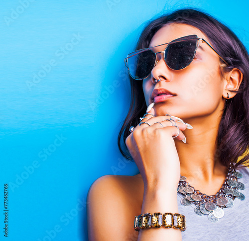 lifestyle people concept. young pretty smiling indian girl with long nails wearing lot of jewelry rings, asian summer happy cool close up copyspace