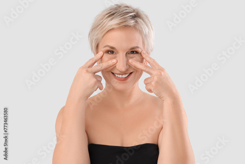 Beautiful mature woman mass...