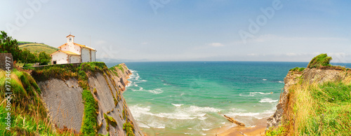 panorama of Itzurun beach and hills of Zumaia coast at summer, Pais Vasco photo