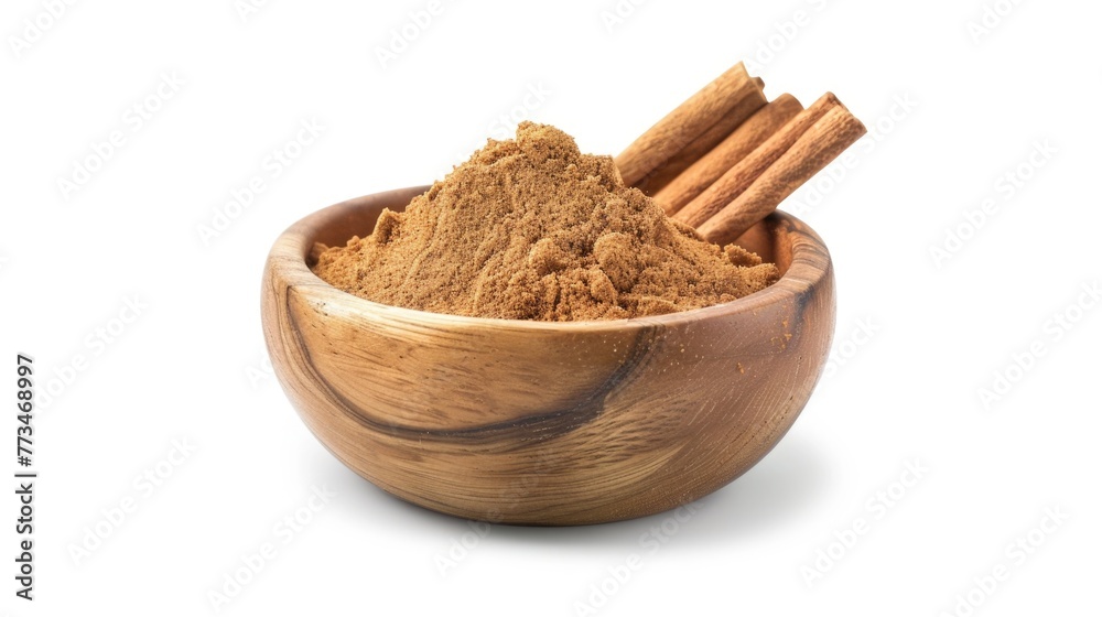 A rustic wooden bowl filled with aromatic cinnamon sticks and powder. Perfect for food or spice related projects A rustic wooden bowl filled with aromatic cinnamon sticks and powder. Perfect for food or spice related projects