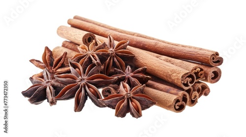 A pile of cinnamon sticks and star anise, perfect for food or holiday-themed designs