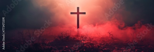 Mystical cross in red fog at night - A haunting image of a Christian cross illuminated amidst red fog and barren landscape, invoking a sense of mystery