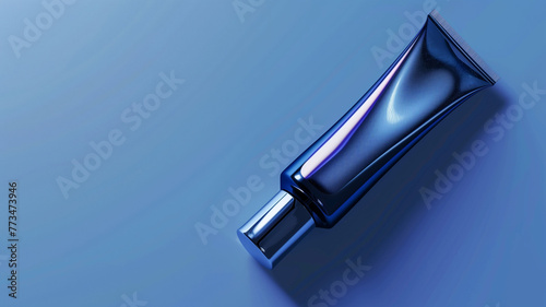 blue tube with hand cream or cosmetic products on blue background