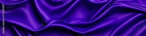 Purple panoramic silk background with blurred satin wavy texture. 