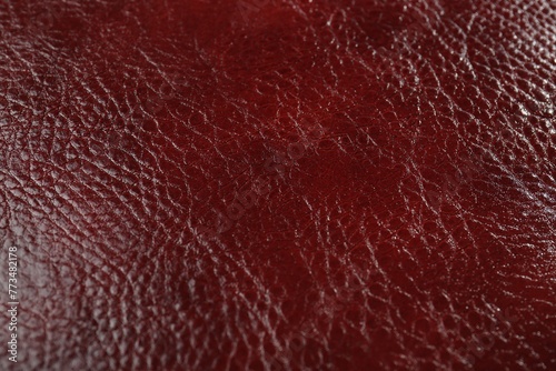 Beautiful red leather as background, above view