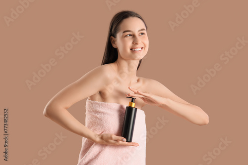 Young woman in towel with c...