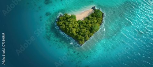 View from the top of the love-shaped island in the middle of the beautiful blue sea © rizky