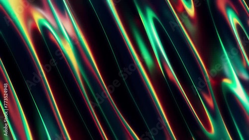 Abstract, fluid and colorful 3D metallic seamless loop animation. Modern and contemporary feel in 4K. Metallic, iridescent and reflective with shades of green, yellow, red, orange, black