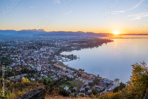 Sunset of the city of Bregenz am Bodensee (Lake of Constanze), toward the Rhine Delta and Swiss Mountains, State of Vorarlberg, Austria photo