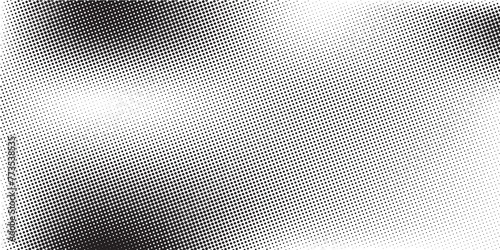 Halftone faded gradient texture. Grunge halftone grit background. White and black sand noise wallpaper.