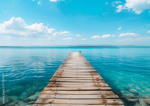 Serene Lake Dock Stretching into Tranquil Blue Waters under Clear Sky