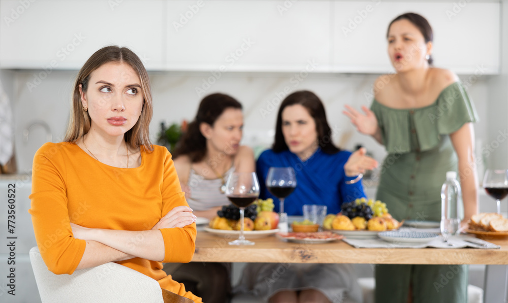 Quarrel during friendly gatherings, three women friends yell at their young sister, offend, say offensive words, accuse them of lying, accuse of inappropriate behavior, gossip
