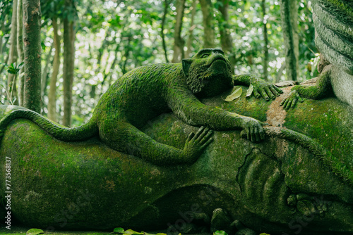 Monkey statue in Monkey Forest  Ubud  Bali  Indonesia.