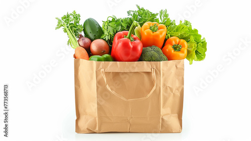 A Brown Paper Bag Full of Colorful Vegetables on a White Background