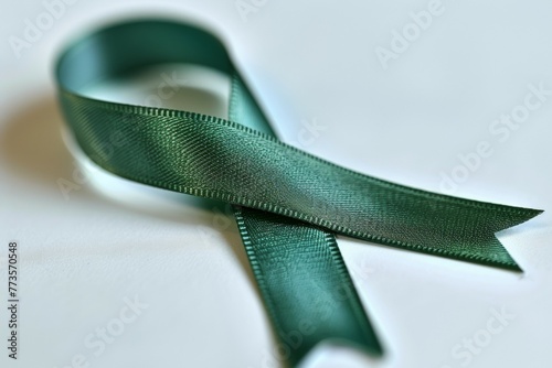 Ribbon of green ribbon with a white background