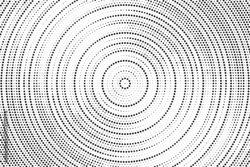 Halftone pattern background with radial effect, round spot shapes, vintage or retro graphic with place for your text. Dotted design element for various purpose. 