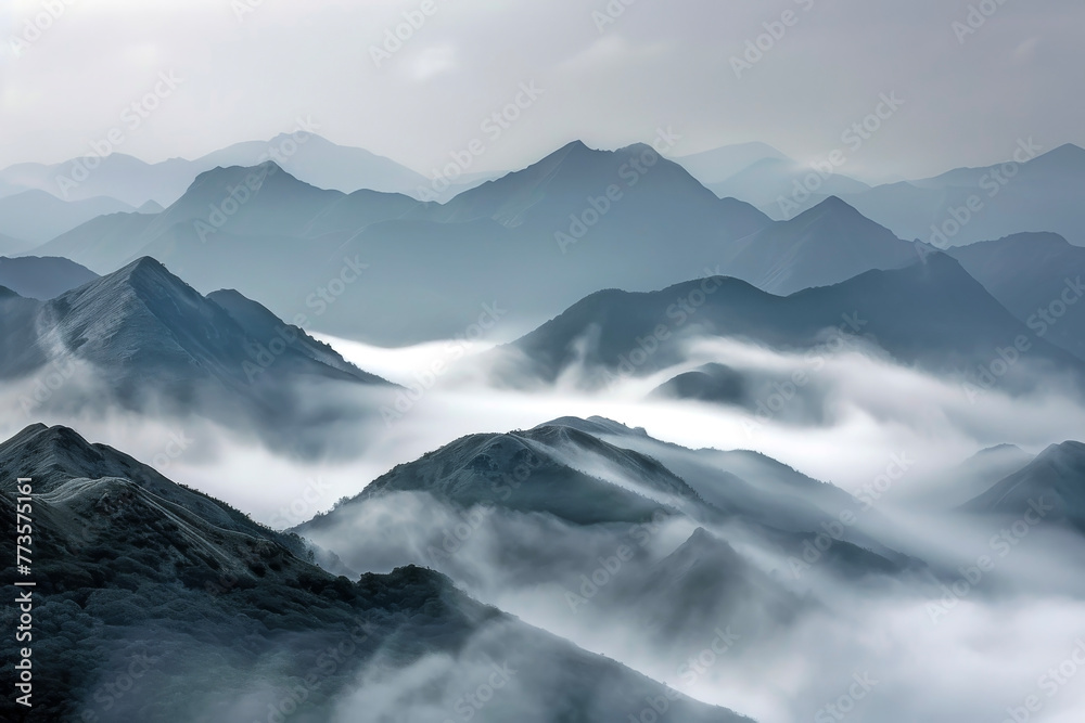 Mountains Adrift in Mist: The Fog Covering the Mountain Ranges Creates a Mystical Atmosphere, Evoking a Sense of Exploration and Adventure