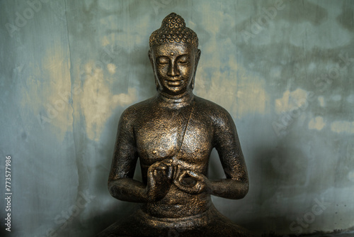 Bronze buddha statue.Ubud, Bali, Indonesia.