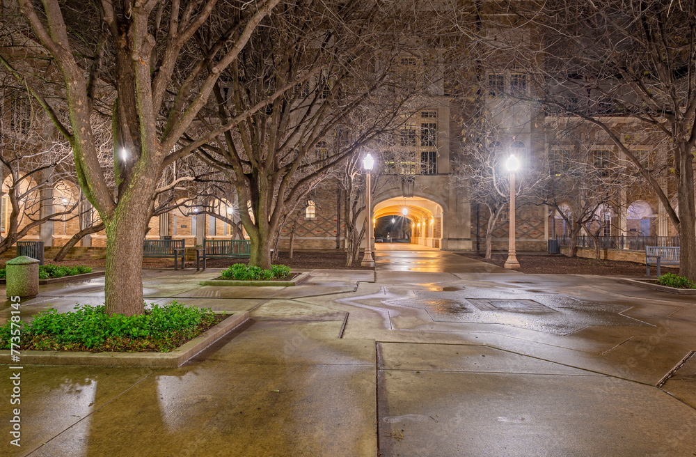 Night view of a pedestrian walkway on the Texas Tech University campus in Lubbock, Texas, USA