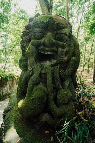 Monkey sculpture in Monkey Forest. Ubud, Bali, Indonesia.