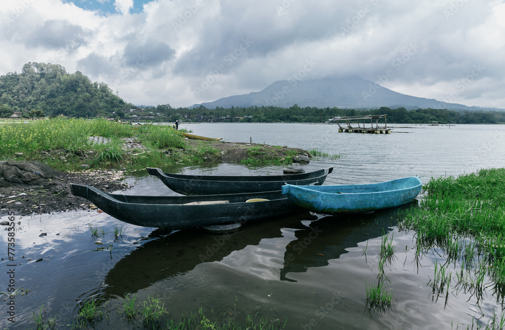 Canoes on Danau Batur lake in the caldera of Mount Batur, Kintamani, Bali, Indonesia.