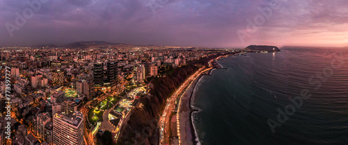 Coast of Lima with barranco and chorillos buildings by night