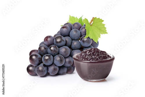 bunch of black grapes and red jam isolated on white background.