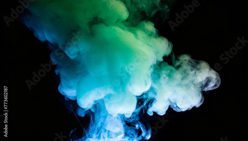 Abstract backdrop Cloud of green and blue smoke on a black isolated background. soft mystery horror design, spooky background texture concept