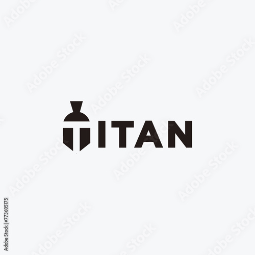 Titan wordmark logo icon on white background with negative space spartan head on T letter