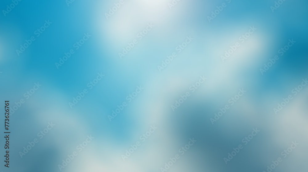 A blurry blue sky with white clouds A blurry blue sky with white clouds