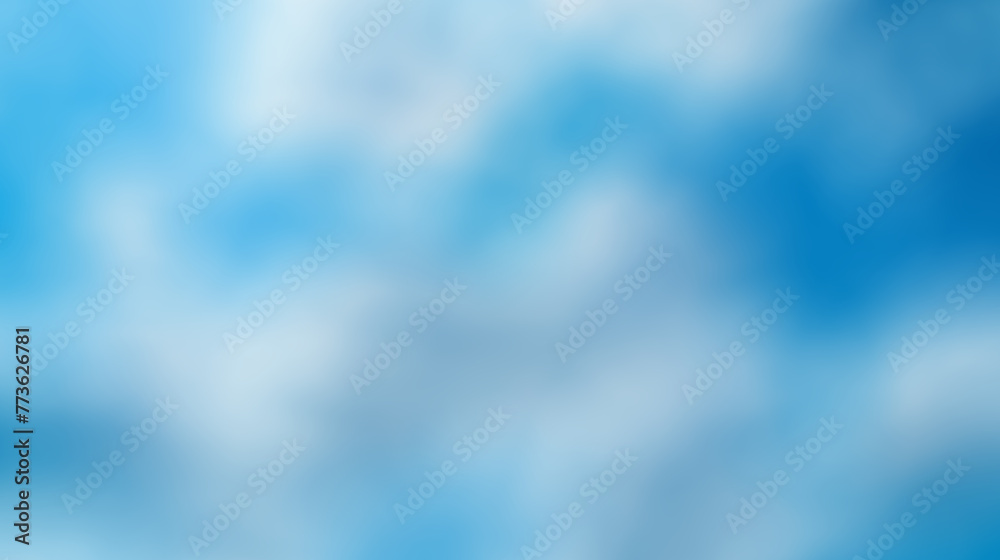 A blurry blue sky with white clouds A blurry blue sky with white clouds