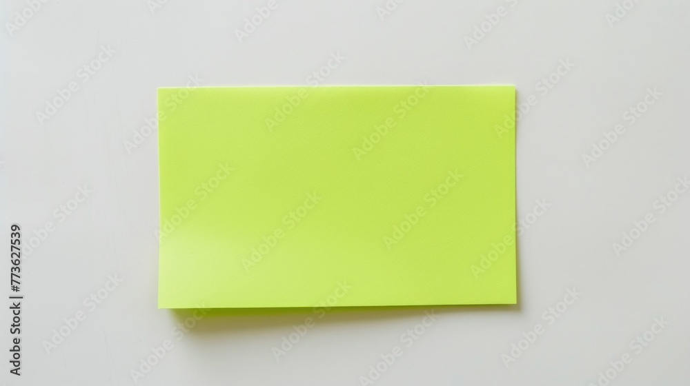 Floating green paper and paper sticker locs over white background