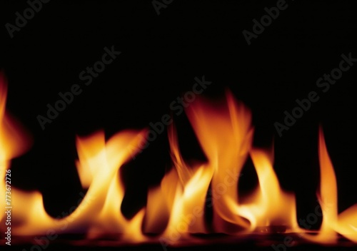 A close up of a fire with its flames reaching up to the top of the frame