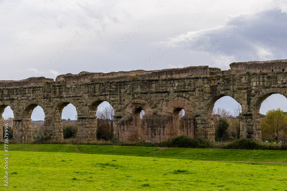 Park of the Aqueducts (Parco degli Acquedotti), an archeological public park in Rome, Italy, part of the Appian Way Regional Park, with monumental ruins of Roman aqueducts.