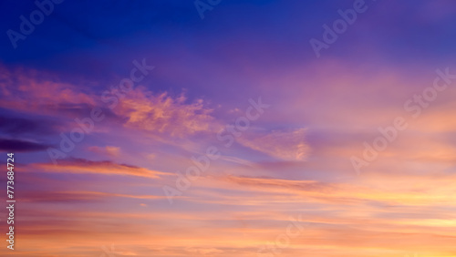 Beautiful multicolored clouds in the sky. Panoramic view of the sky. Bright colors of clouds in the sky.