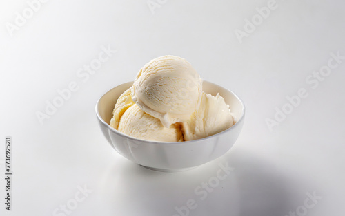 Vanilla ice cream scooped out of container 
