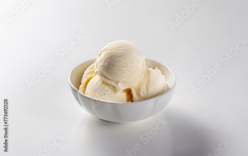 Vanilla ice cream scooped out of container
