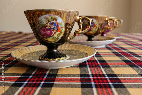 Gold Plate Antique Cups of Coffe  photo