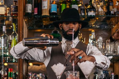 Signature cocktails: a creative bartender at his bar