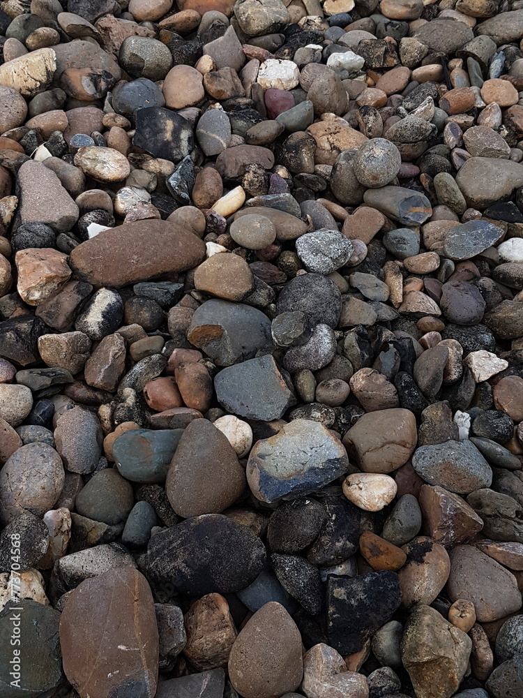 abstract Textured background with round pebble stones. Vacation holiday recreation on beach concept. High quality photo. Fragment with a texture of rock. abstract Textured background with round pebble stones. Vacation holiday recreation on beach concept. High quality photo. Fragment with a texture of rock.