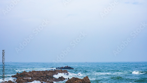 Huangdao District, Qingdao City, Shandong Province-Sprays on the Golden Beach photo