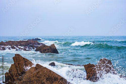 Huangdao District, Qingdao City, Shandong Province-Sprays on the Golden Beach photo