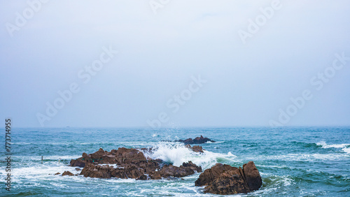 Huangdao District, Qingdao City, Shandong Province-Sprays on the Golden Beach photo