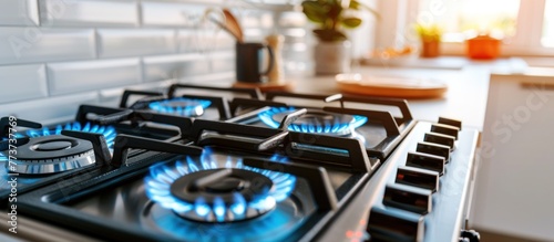 Gas burning blue flames, Closeup of modern gas stove on kitchen
