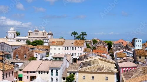 Aerial view of the houses in the Pelourinho neigbourhood and the sea at background, Salvador, Bahia, Brazil photo