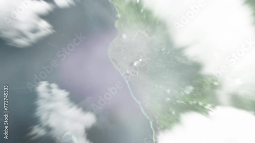 Earth zoom in from space to Auki, Solomon Islands. Followed by zoom out through clouds and atmosphere into space. Satellite view. Travel intro. Images from NASA photo