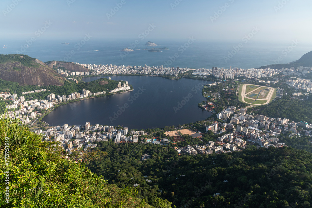 Beautiful view from Corcovado Mountain to city, lagoon and ocean